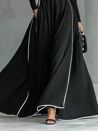 Elegant Black Maxi Dress with White Stitching, High Neck, Long Sleeves, and Slim Waist for a Sophisticated Look